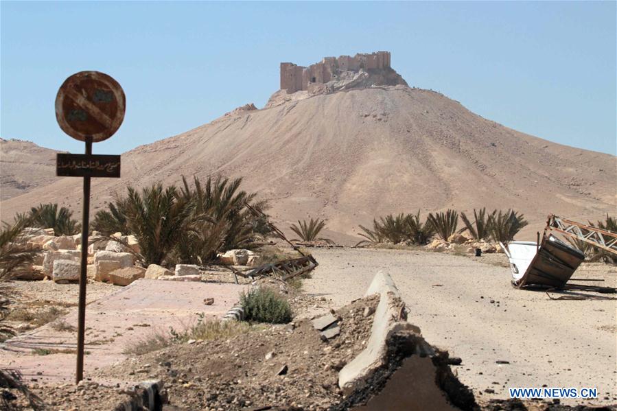 Damaged ancient architectures are seen in Palmyra of central Syria, on April 1, 2016. 