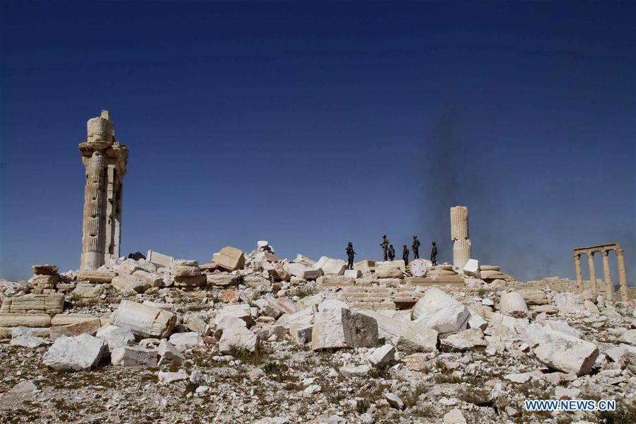 Damaged ancient architectures are seen in Palmyra of central Syria, on April 1, 2016. 