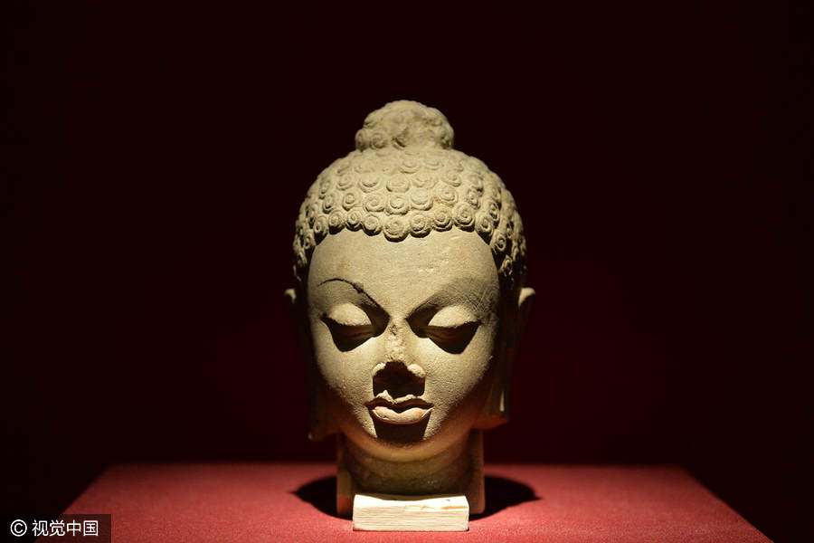 Chinese and Indian sculptures on display at the Palace Museum in Beijing