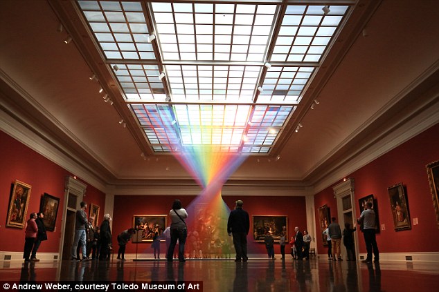 A spectacular manmade rainbow captured in the centre of an art gallery has been wowing visitors