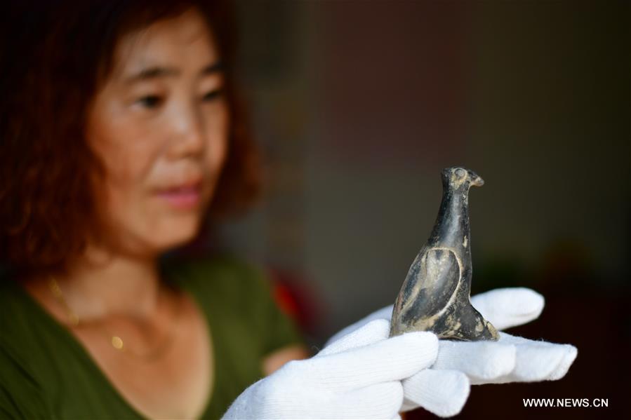 Carbon dating confirms age of 3,800-year-old pottery bird statue