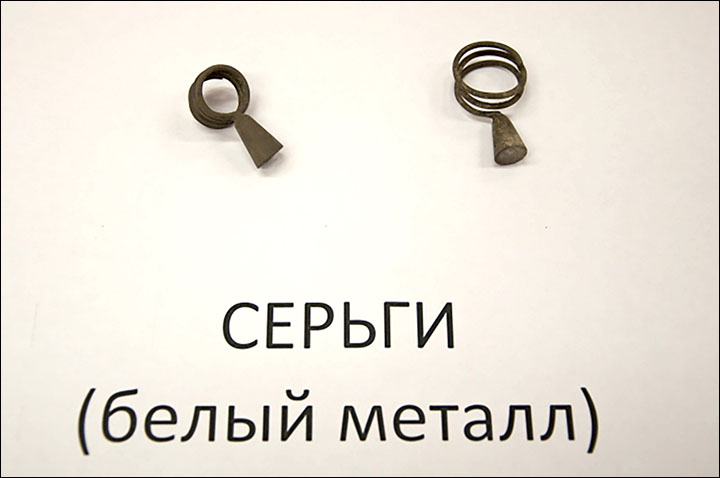 Ancient warrior unearthed marching to afterlife with his dagger drawn, wearing stylish earrings Ancient warrior unearthed marching to afterlife with his dagger drawn, wearing stylish earrings
