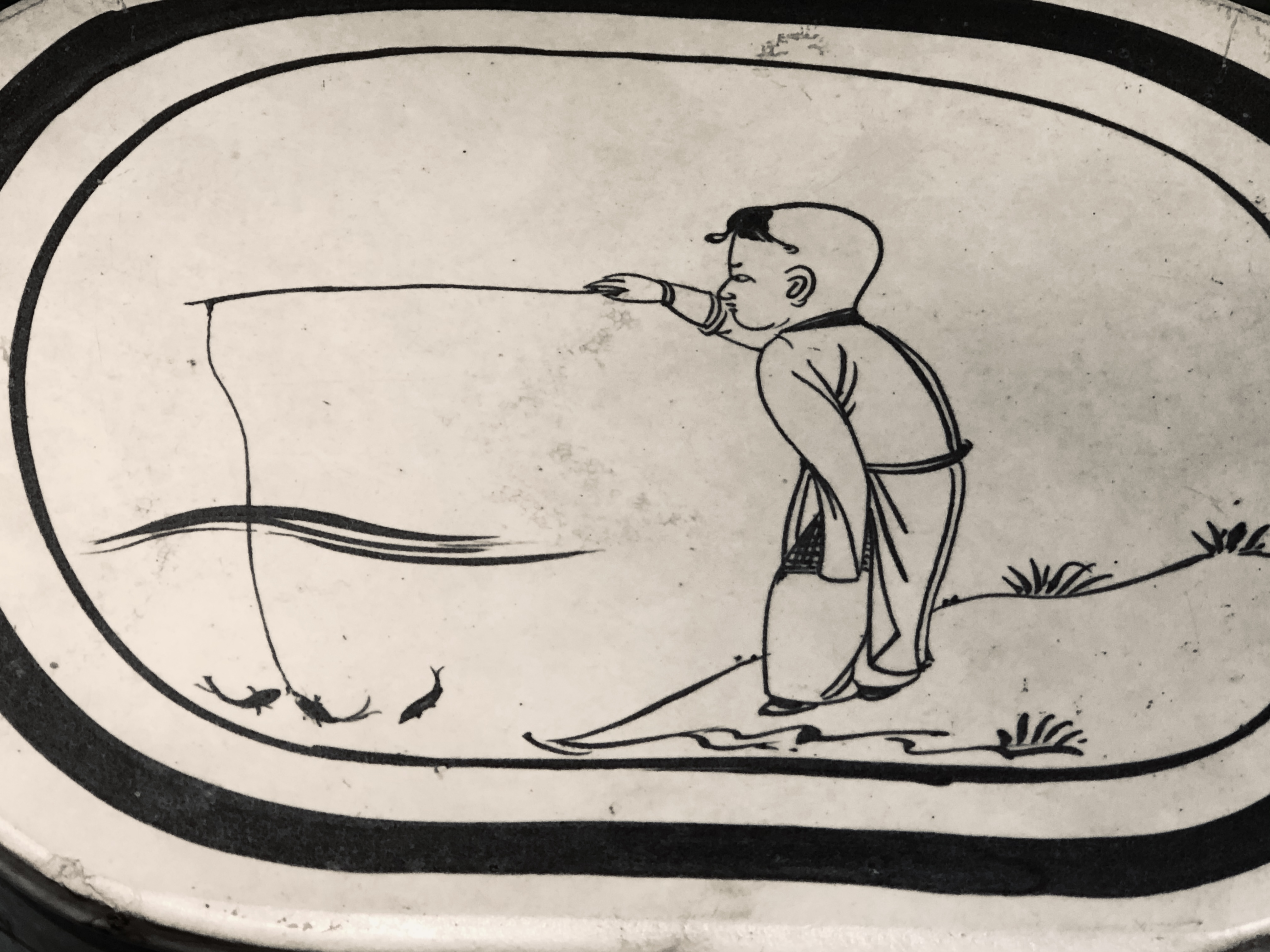 图三 童子垂钓枕(局部） 河北省博物院藏