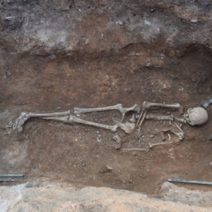 Skeleton of Ancient Woman Lying on Her Bronze Bed Found in Greece