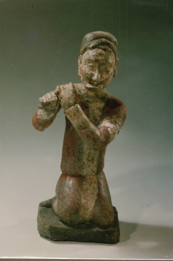 Z1674  隋贴金彩绘执横笛乐伎俑  隋  石.jpg